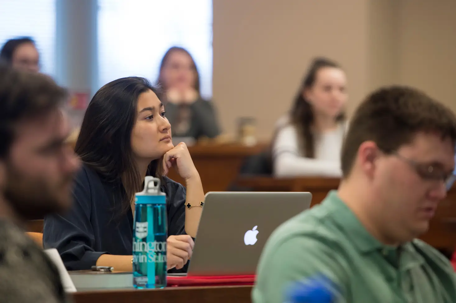WashU Law student listening in class