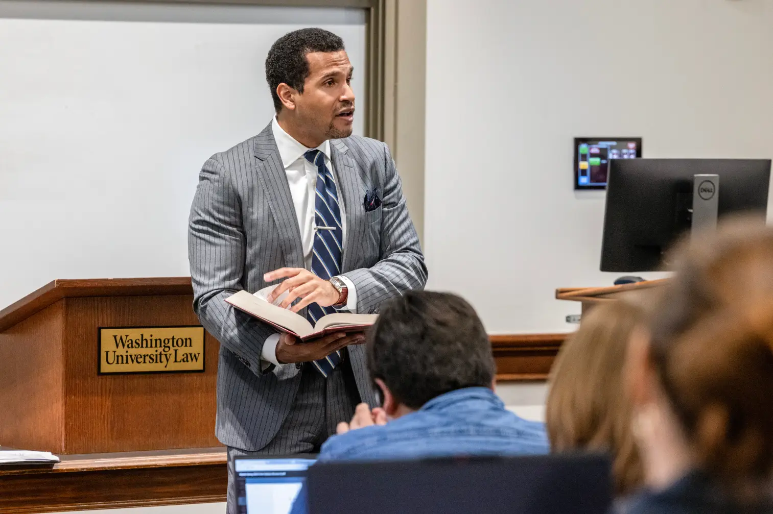 Professor at WashU Law teaching class
