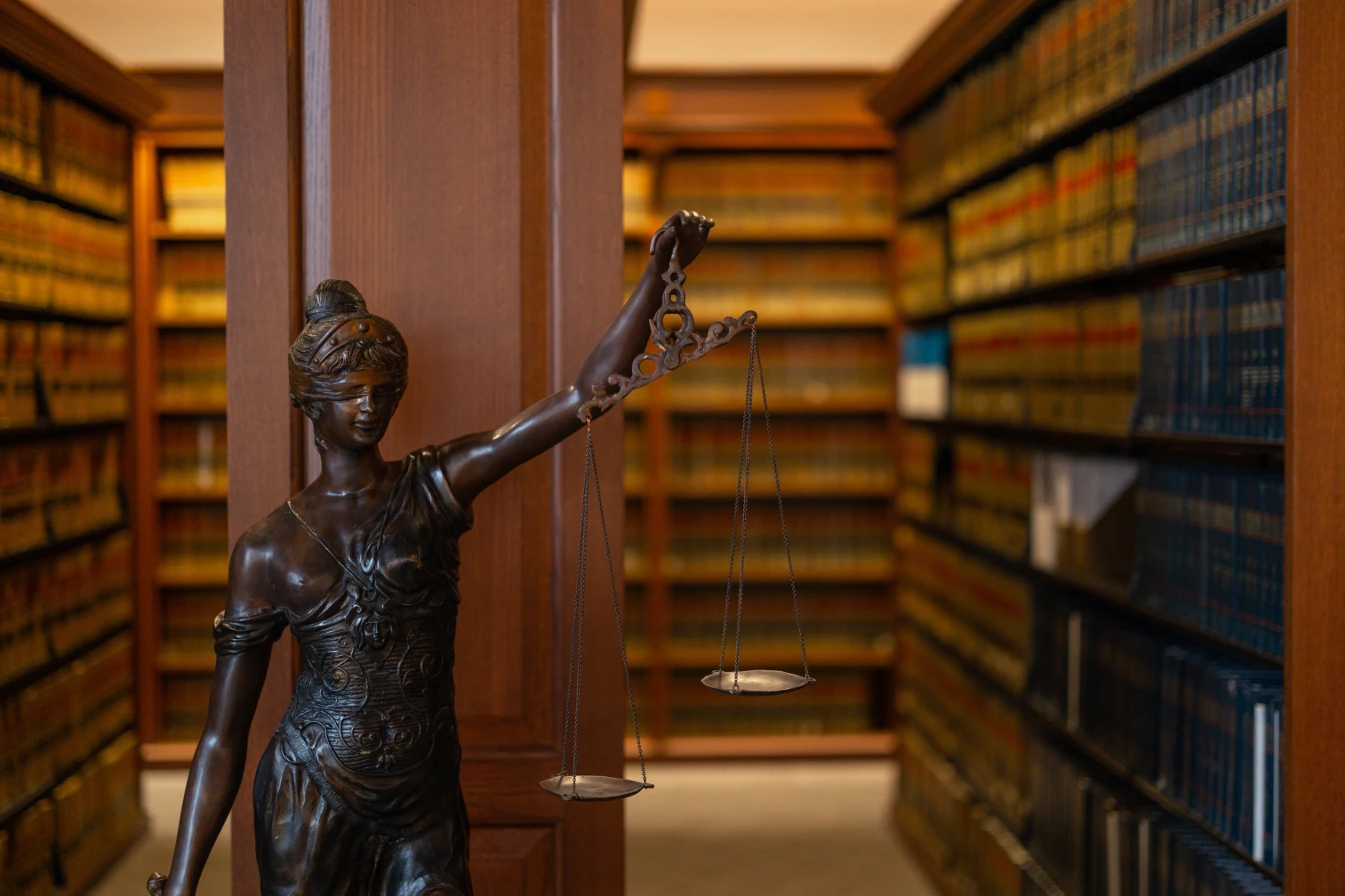 Lady justice in the law library