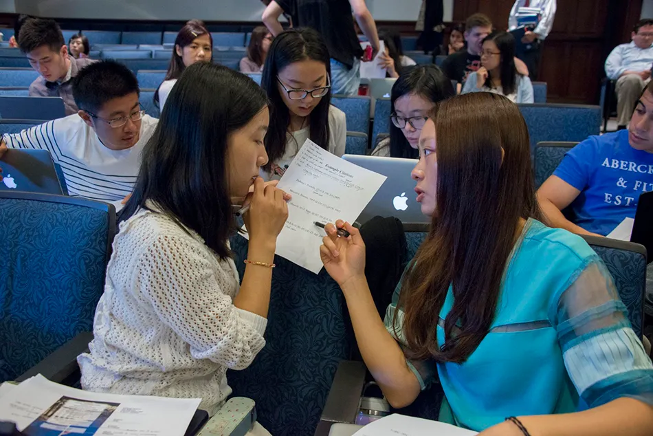 International students in class working.