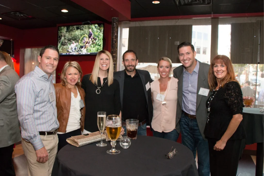 WashU Law alumni joining together at a restaurant 