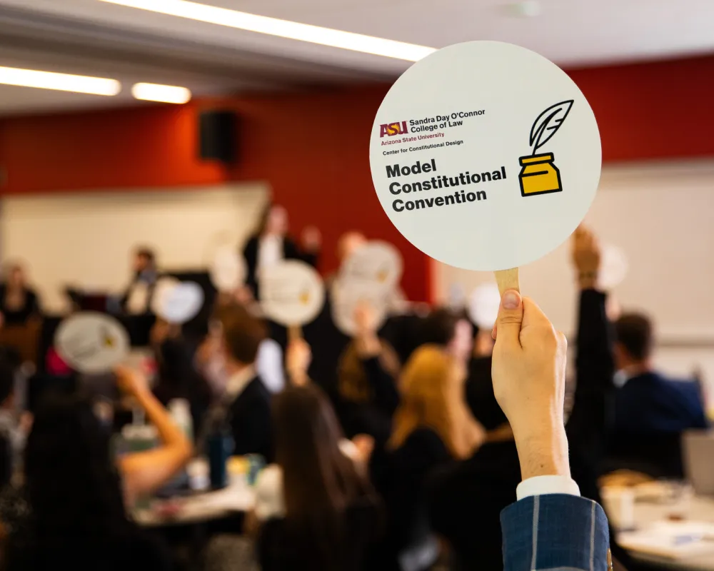 2025 Constitution Convention Hand Raised