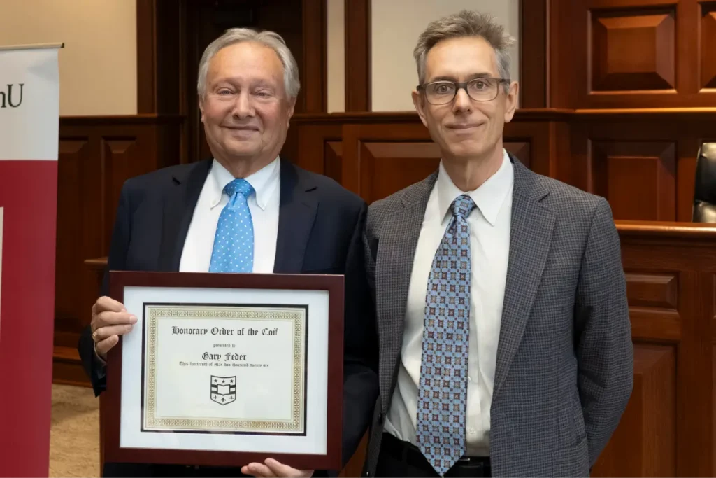 Gary Feder, left, is pictured with Kevin Collins, Vice Dean for Academic Affairs and Edward T. Foote II Professor of Law