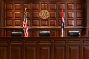 Courtroom with U.S. and Missouri flags behind the judge's bench, venue for WashU Law's Arbitration at the Frontier event