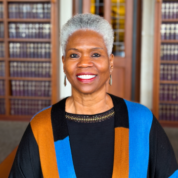 Picture of Professor Kimberly Norwood in the library Reading Room.