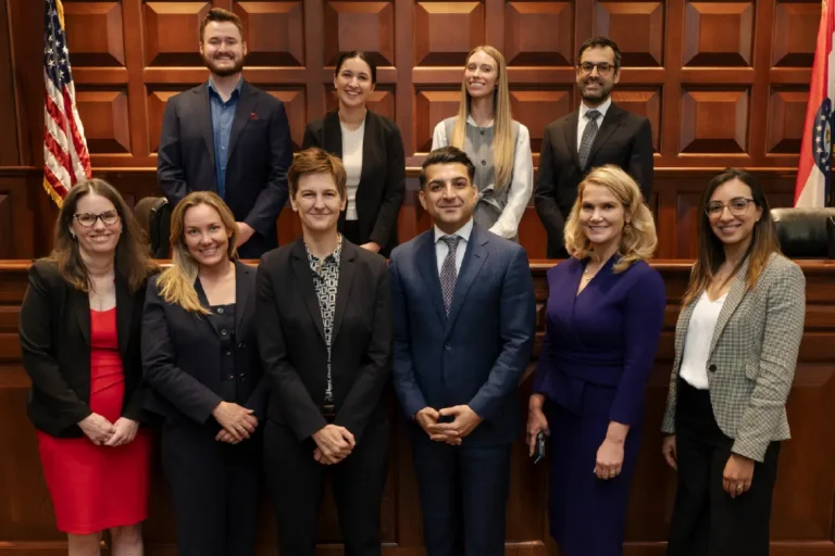 WashU Law Professor MJ Durkee and Imad Khan with other participants of the Whitney R. Harris World Law Institute Annual Arbitration Symposium