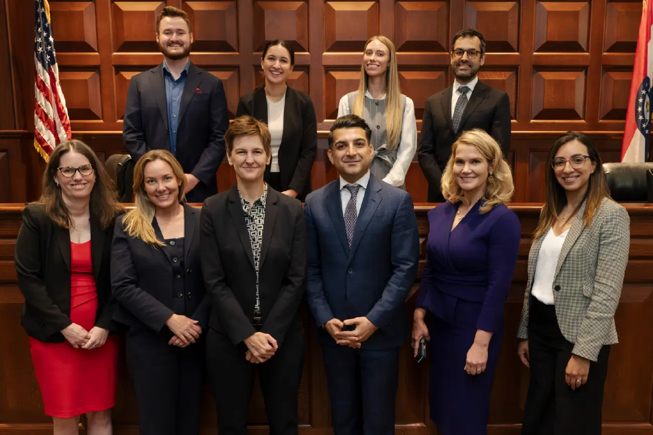 WashU Law Professor MJ Durkee and Imad Khan with other participants of the Whitney R. Harris World Law Institute Annual Arbitration Symposium
