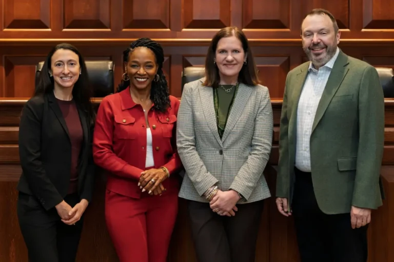 The Cordell Institute's Montrece Ransom stands with WashU Law Professor Rachel Sachs, Former FTC Chair Rebecca Kelly Slaughter, and WashU Law's Professor Neil Richards at the Cordell Convergence