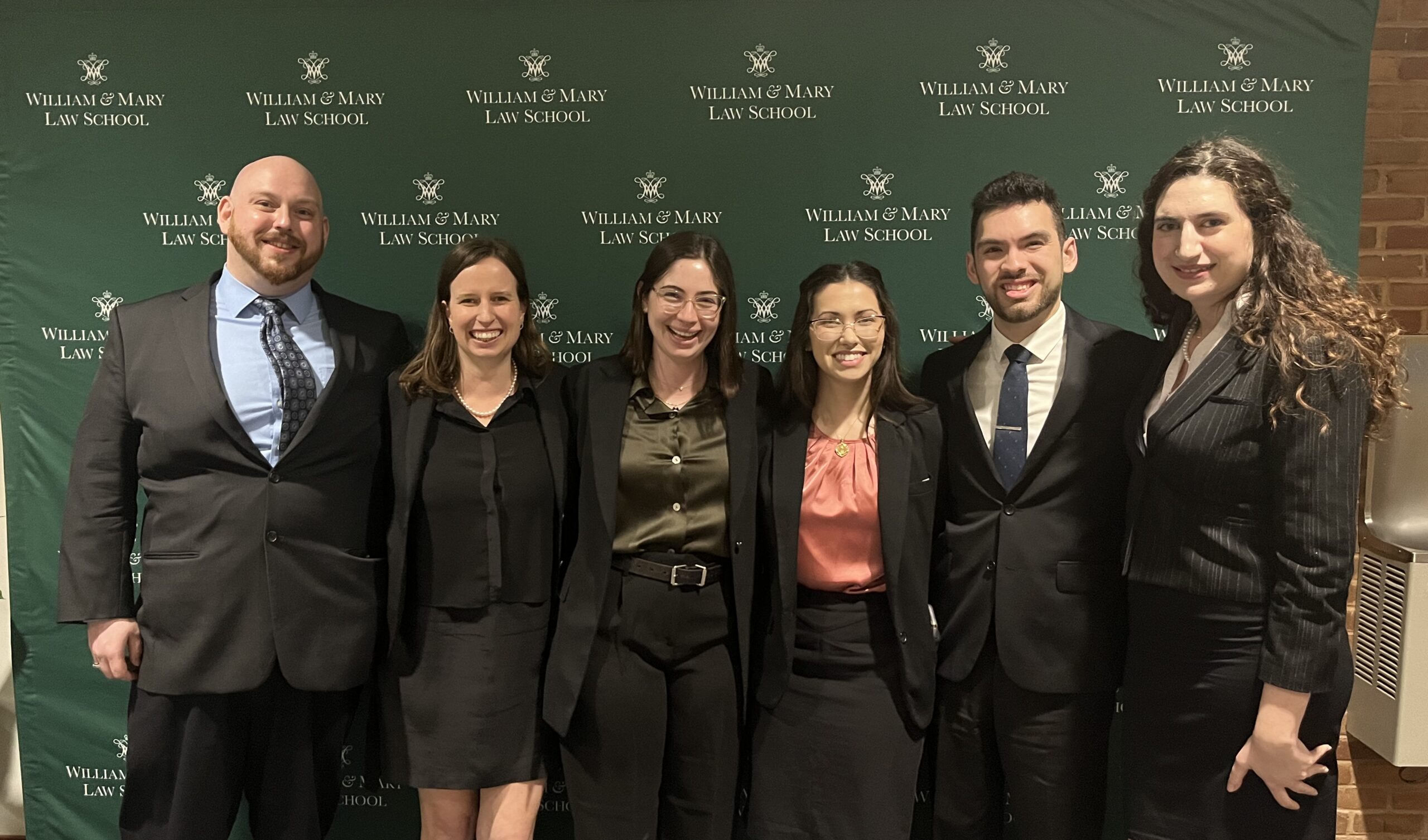 Picture of 6 law students, at a moot court competition event 2024